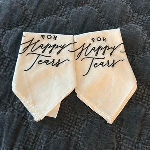 2 handkerchiefs that read “For Happy Tears”